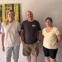 Staff at SMI smiling on volunteering day